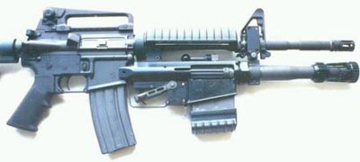 XM-26, установленный под стволом карабина M4A1 ранний вариант
