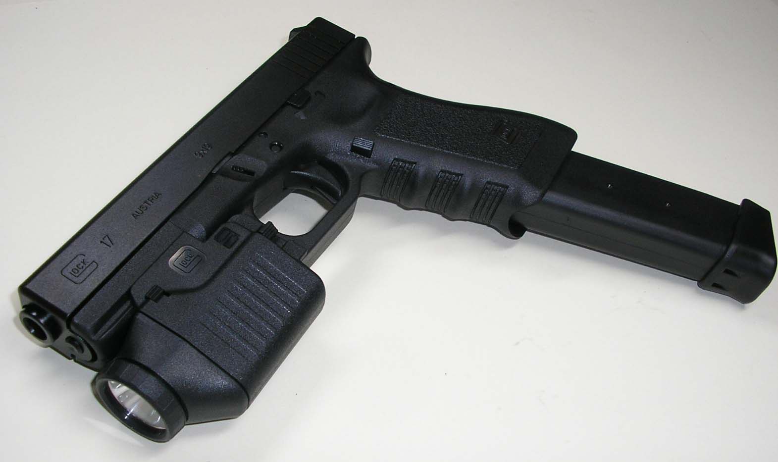 Glock 17 (with enlarged magazine) .