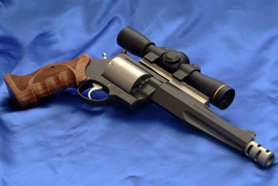 Smith & Wesson Magnum with optics (right)