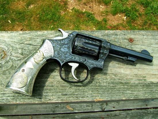 Smith & Wesson (fully engraved)