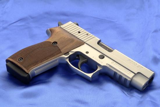 Sig Sauer P220ST (right)